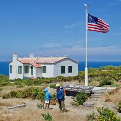 a person standing in front of a house
