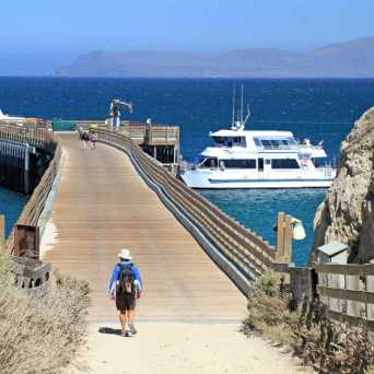 a wooden boat in a body of water