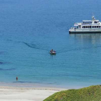 a small boat in a large body of water