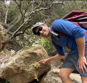 a man standing on a rock