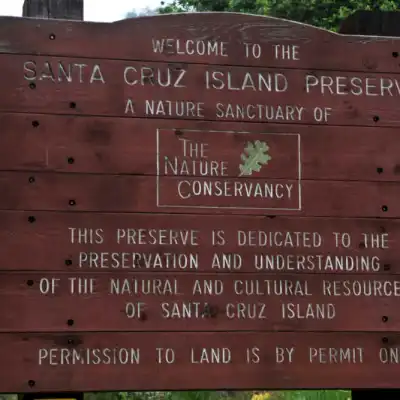 a sign on a wooden pole