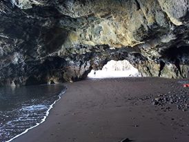 a group of people on a beach